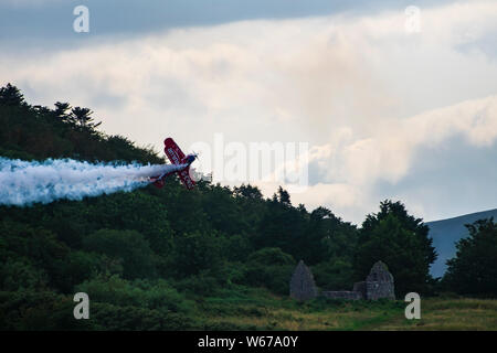 Aerobatic solo performs at Bray Air Display 2019 against Wicklow Mountains. Ireland. Stock Photo