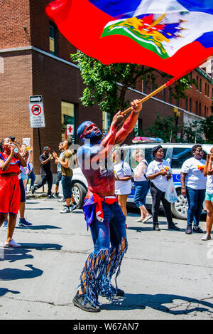 Caribbean parade in downtown Montreal Stock Photo