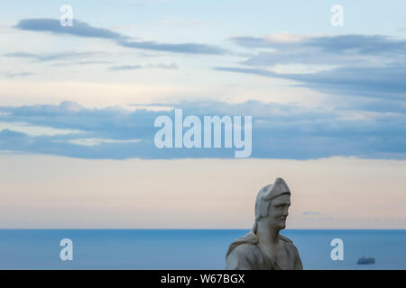 Male statue from the belvedere, the so-called Terrazza dell'infinito, The Terrace of Infinity seen on the sunset, Villa Cimbrone, Ravello village, Ama Stock Photo