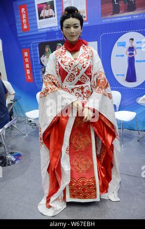 --FILE--A humanroid robot is on display at China International Robot Show (CiROS) 2018 in Shanghai, China, 4 July 2018.   Humanroid robots featuring C Stock Photo