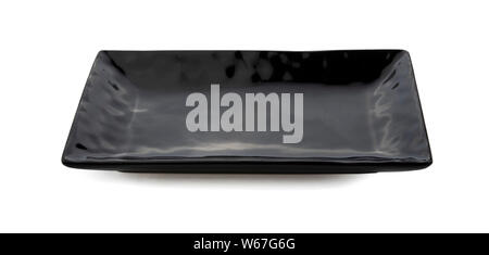 Black plate isolated on white background Stock Photo