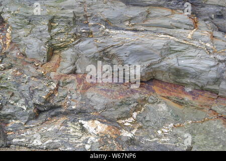 Natural Background of Metasedimentary Rock. St Agnes, North Cornwall, UK. Stock Photo