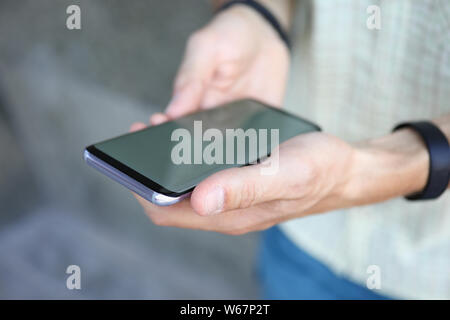 Man using modern cellphone Stock Photo