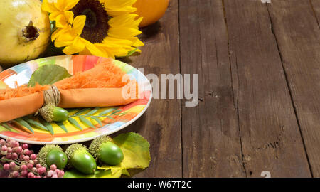 Rustic autumn table setting on a wooden table Stock Photo