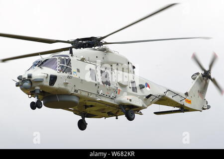 Dutch NH Industries NH90 helicopter arriving at RIAT 2019 at RAF Fairford, Gloucestershire, UK Stock Photo