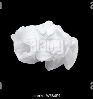 Crumpled white paper or plastic bag garbage isolated on black background Stock Photo