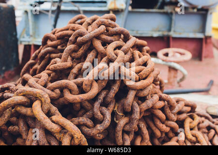 Old industrial chain ropes, the big rusty chains. Stock Photo