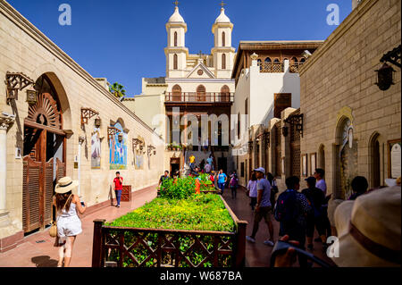 The courtyard of the Hanging Church. The walls of the Courtyard are decorated with contemporary mosaics Stock Photo