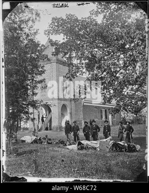 St. Peter's Church, near the White House, Virginia. (where G. Washington may have been married to Martha). Personnel as given in Pictorial History of Civil War, Review of Reviews, 1911, left to right: Maj. A.M. Clark, volunteer A.D.C.; Lt. Col. J.H. Taylor, A.G.; Capt. F.N. Clarke, Chief of Arty.; General E.V. Sumner, Lt. Col. J. F. Hammond, Medical Director; Capt. Pease, Minnesota Vols., Chief of commissary; Capt. Gabriel Grant. Stock Photo