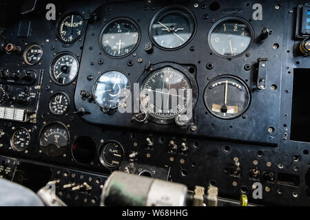 DONCASTER, UK - 28TH JULY 2019: Close up of a planes cockpit showing instruments and panels from a two seater airplane Stock Photo