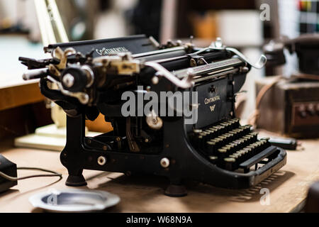 DONCASTER, UK - 28TH JULY 2019: An old Continental typewriter sits on a wooden table on display at a WW2 museum in Doncaster Stock Photo