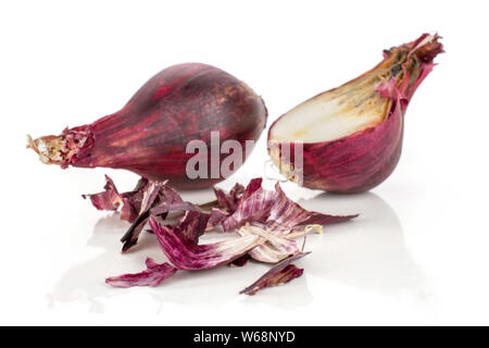 One half lot of pieces of stale red onion isolated on white background Stock Photo