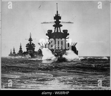 USS PENNSYLVANIA and battleship of COLORADO class followed by three cruisers USS Louisville (CA-28), USS Portland (CA-33), and USS Columbia (CL-56) into Lingayen Gulf, Philippines, in January 1945.; General notes:  Note: The wartime censors has removed Pennsylvania´s radar antennas. Stock Photo