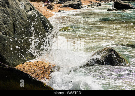 Water splashing on the rocks of the famous Shell Beach, in St. Barth’s Island (St. Bart’s Island) Caribbean. Stock Photo