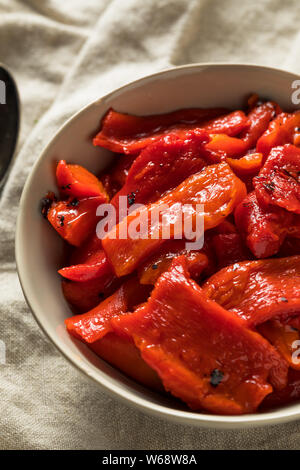 Organic Marinated Roasted Red Peppers in a Bowl Stock Photo