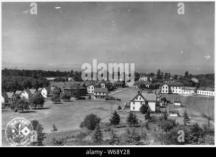 View of administrative area of Fort Stevens. Parade ground is in foreground.; Scope and content:  Beginning with the Civil War, the U.S. Army recognized a need to provide for coastal defenses in the Pacific NW along the Columbia River and in the Puget Sound. A number of forts, many no longer in service, were built for this purpose. Stock Photo