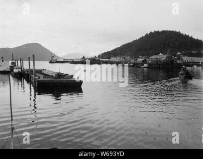 Wrangell harbor, Alaska. Dredge at work in harbor Stock Photo