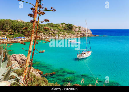 Sea skyview landscape photo Ladiko bay near Anthony Quinn bay on Rhodes island, Dodecanese, Greece. Panorama with nice sand beach and clear blue water Stock Photo