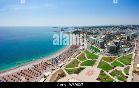 Aerial birds eye view drone photo of Elli beach on Rhodes city island, Dodecanese, Greece. Panorama with nice sand, lagoon and clear blue water. Famou Stock Photo