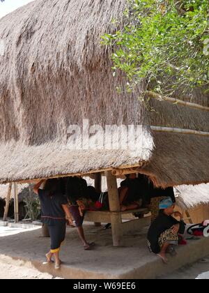 July 29, 2018 - Sade, Lombok/Indonesia: Preparation of villagers before performent is done Stock Photo