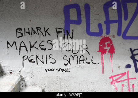 Anti shark fin soup writing on the wall in Sheung Wan , Hong Kong Stock Photo