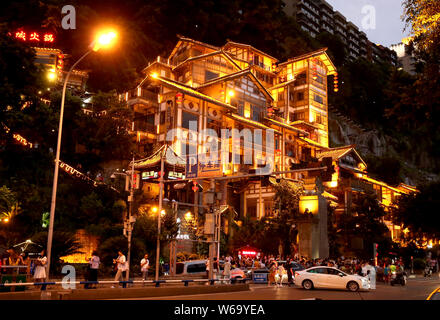 Night view of the illuminated Hongyadong settled house complex in Jiangbei district, Chongqing, China, 8 June 2018.    Hongyadong is located within 50 Stock Photo