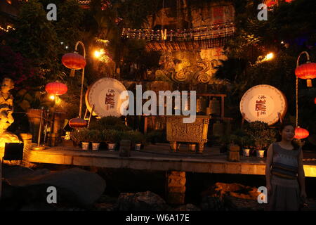 Night view of the illuminated Hongyadong settled house complex in Jiangbei district, Chongqing, China, 8 June 2018.    Hongyadong is located within 50 Stock Photo