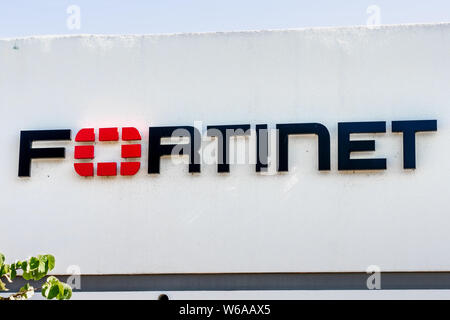July 31, 2019 Sunnyvale / CA / USA - Fortinet logo displayed at their offices in Silicon Valley; Fortinet, Inc. is an American company that develops a Stock Photo