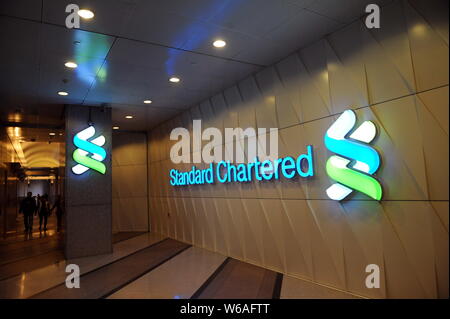 --FILE--View of a signboard of London-listed Standard Chartered Bank in Hong Kong, China, 8 Janury 2015.   Standard Chartered Bank (Hong Kong) Ltd. an