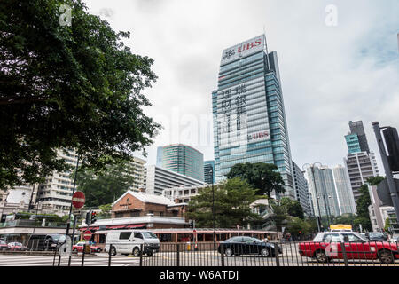 --FILE--A logo of Swiss bank UBS Group is pictured on an office building in Shanghai, China, 4 December 2017.   The cost of living in Beijing and Shan Stock Photo