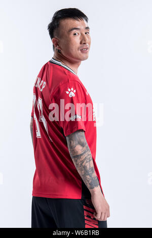 Portrait of Chinese soccer player Wang Jingbin of Guangzhou Evergrande ...