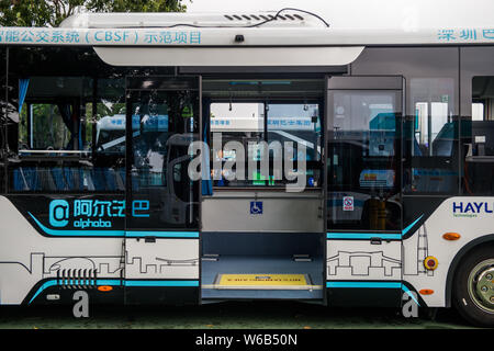 An Alphabus smart bus with self-driving bus technology is pictured at a base in Shenzhen city, south China's Guangdong province, 9 May 2018.   The sel Stock Photo