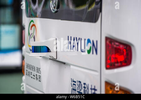 An Alphabus smart bus with self-driving bus technology is pictured at a base in Shenzhen city, south China's Guangdong province, 9 May 2018.   The sel Stock Photo