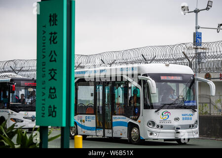 Alphabus smart buses with self-driving bus technology are pictured at a base in Shenzhen city, south China's Guangdong province, 9 May 2018.   The sel Stock Photo