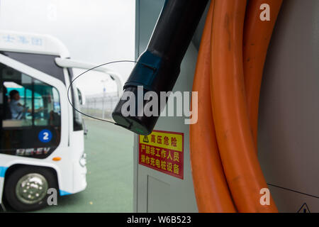 Alphabus smart buses with self-driving bus technology are pictured at a base in Shenzhen city, south China's Guangdong province, 9 May 2018.   The sel Stock Photo