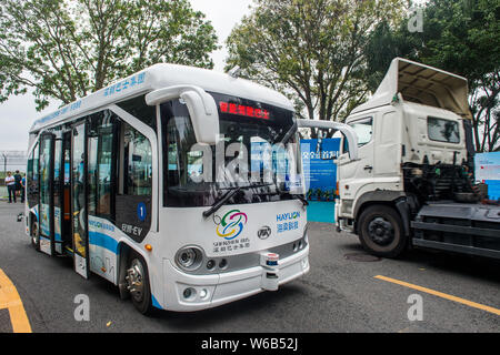 An Alphabus smart bus with self-driving bus technology is pictured at a base in Shenzhen city, south China's Guangdong province, 9 May 2018.   The sel Stock Photo