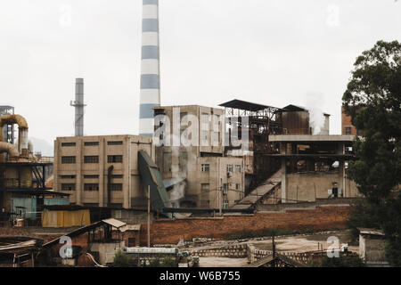 Industrial installation exhausting fumes in China Stock Photo