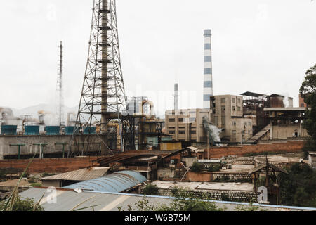 Industrial installation exhausting fumes in China Stock Photo