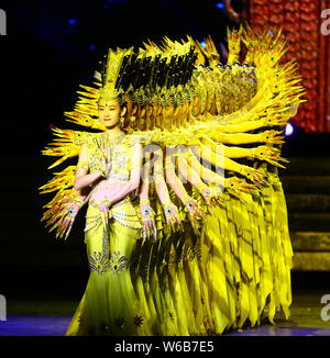 Chinese hearing impaired dancers from China Disabled People's Performing Art Troupe give a charity performance of the Thousand-Hand Guan Yin, the Bodh Stock Photo