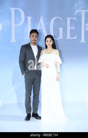 Chinese actress Yang Mi, right, and Taiwanese actor and model Ethan Juan attend a promotional event for PIAGET in Beijing, China, 11 May 2018. Stock Photo