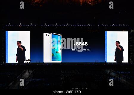 Luo Yonghao, founder and CEO of Smartisan Technology Co., Ltd., introduces the Smartisan R1 smartphone during the product launch event at the Beijing Stock Photo