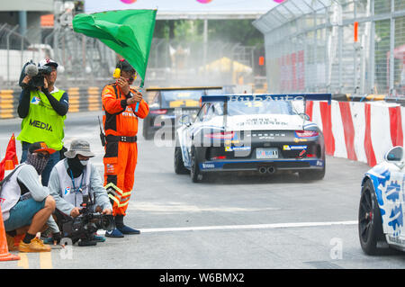 Bang Saen, Thailand - July 1, 2017: Participants of Porsche Carrera Cup Asia exiting the pit lane at Bang Saen Street Circuit in Bang Saen, Chonburi, Stock Photo