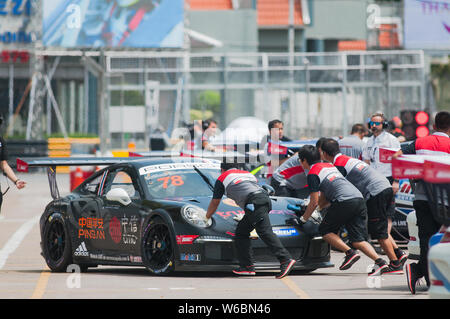 Bang Saen, Thailand - July 1, 2017: The Porsche GT3 Cup of Suttiluck Buncharoen from Thailand being pushed at the pit lane during Porsche Carrera Cup Stock Photo