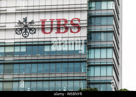 --FILE--A logo of Swiss bank UBS Group is pictured on an office building in Shanghai, China, 6 November 2017.   Swiss bank UBS Group appointed leaders Stock Photo