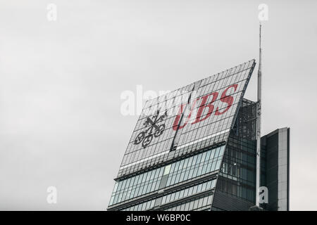 --FILE--A logo of Swiss bank UBS Group is pictured on an office building in Shanghai, China, 6 November 2017.    China's top securities regulator has Stock Photo