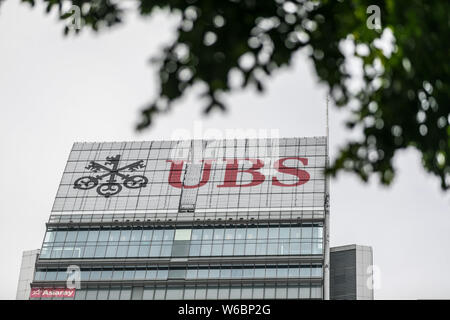 --FILE--A logo of Swiss bank UBS Group is pictured on an office building in Shanghai, China, 6 November 2017.   Swiss bank UBS Group appointed leaders Stock Photo