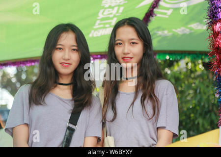 その他 China Through Camera Vol. 2: Folk Series (Tu Nationality / Girls Festival) A set of twin girls take part in the 14th International Twins and