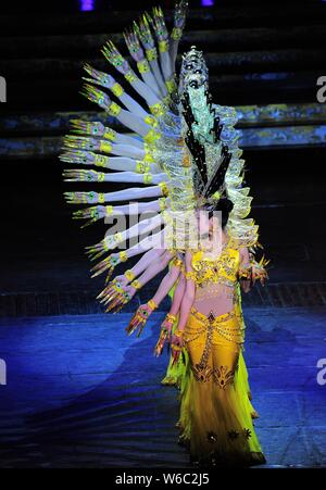 Chinese hearing impaired dancers from China Disabled People's Performing Art Troupe give a charity performance of the Thousand-Hand Guan Yin, the Bodh Stock Photo