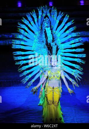 Chinese hearing impaired dancers from China Disabled People's Performing Art Troupe give a charity performance of the Thousand-Hand Guan Yin, the Bodh Stock Photo