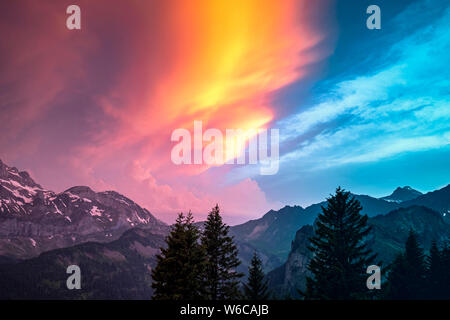 Spectacular sundown of the Dents du Midi mountain range in Switzerland Stock Photo